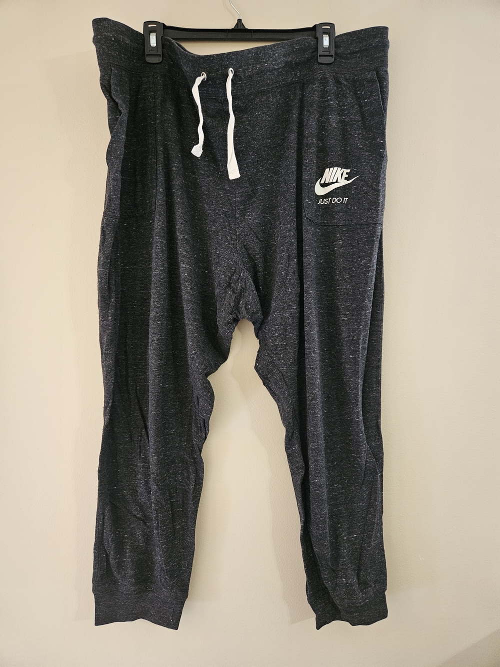 Women's Black Heather Nike Joggers with White Drawstring & Logo Patch